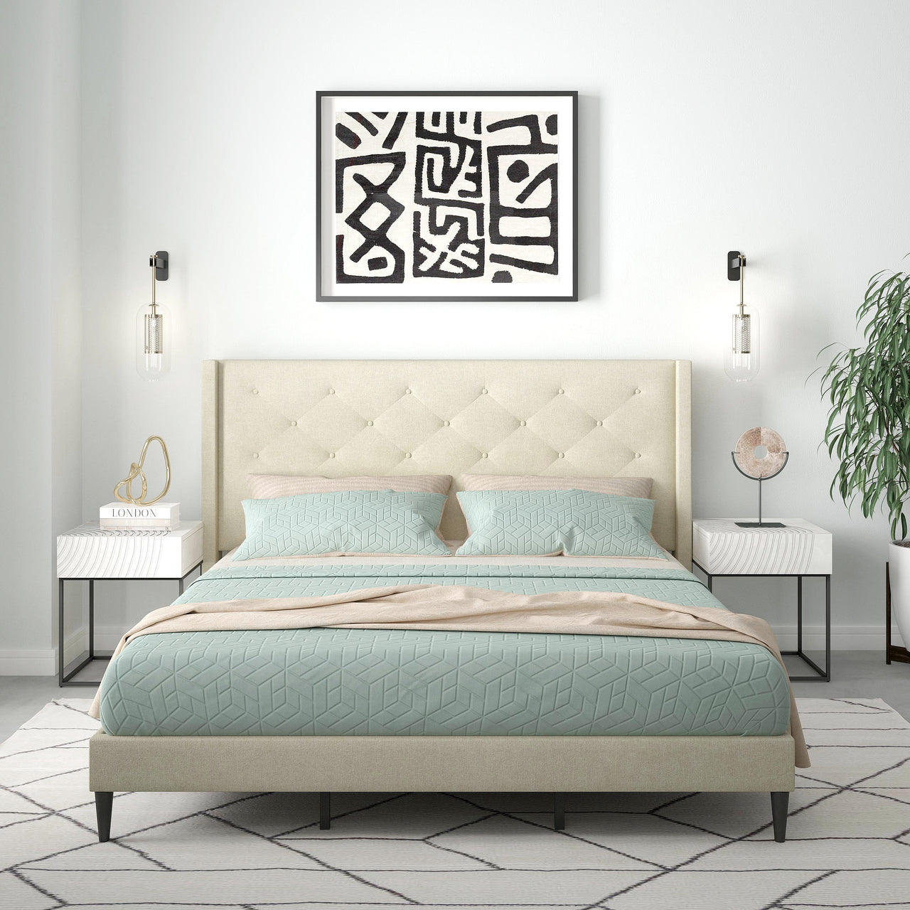 Modern bedroom with a bed, nightstands, and abstract wall art.