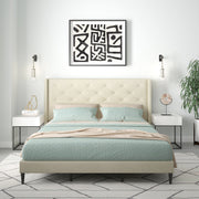 Modern bedroom with a bed, nightstands, and abstract wall art.