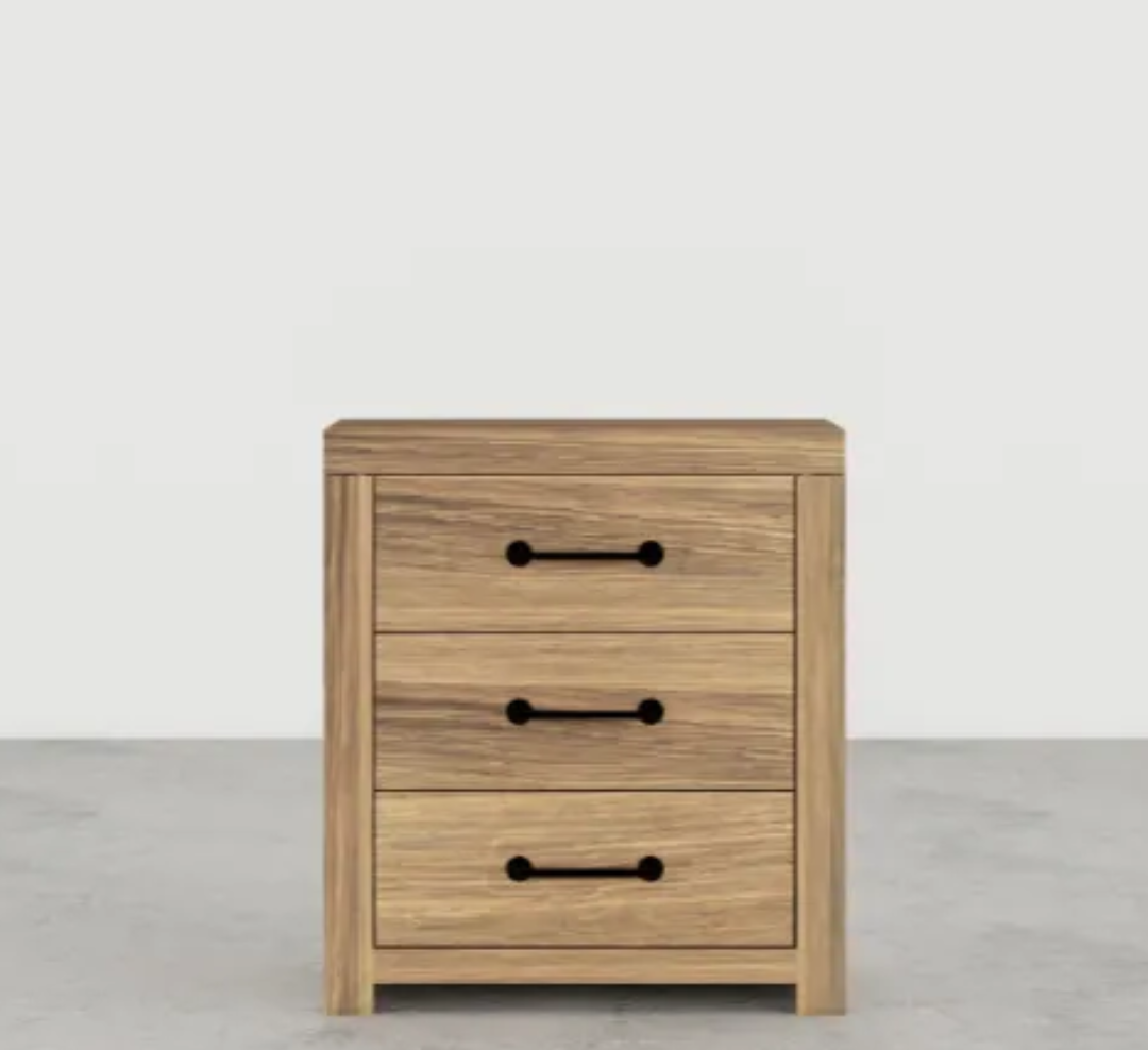 Wooden nightstand with three drawers on a light gray background